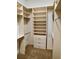 Large walk-in closet with shelving and drawers at 1515 Gadsden Pl, The Villages, FL 32162