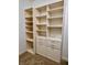 Bright walk-in closet with ample shelving and drawers at 1515 Gadsden Pl, The Villages, FL 32162