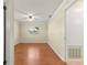 Bedroom with wood floors and walk-in closet at 17664 Se 105Th Terrace, Summerfield, FL 34491