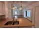 Kitchen features granite countertops and a view into the living room at 1895 Country Club Blvd, Mount Dora, FL 32757