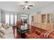 Spacious living room featuring hardwood floors and ample natural light at 2005 Palo Alto Ave, The Villages, FL 32159