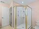 Large walk-in shower with glass enclosure at 2005 Palo Alto Ave, The Villages, FL 32159
