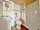 Clean bathroom with a shower/tub combo and wood accents at 248 E Magnolia St, Groveland, FL 34736