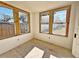 Spacious bedroom with wood flooring and multiple windows at 248 E Magnolia St, Groveland, FL 34736