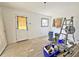 Unfinished spare bedroom with new door and window at 248 E Magnolia St, Groveland, FL 34736