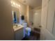 Simple bathroom with toilet, bathtub, and a vanity at 24825 Pine Hl, Leesburg, FL 34748