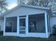Spacious screened-in porch, perfect for relaxing and enjoying the outdoors at 24825 Pine Hl, Leesburg, FL 34748