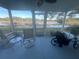 Relaxing screened porch overlooking a tranquil lake at 24825 Pine Hl, Leesburg, FL 34748