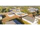 Aerial view of a residential property with a fenced backyard and screened in patio at 2555 Sw 154Th Place Rd, Ocala, FL 34473