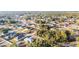 Aerial view showing a house nestled in a neighborhood with surrounding homes at 2555 Sw 154Th Place Rd, Ocala, FL 34473