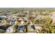 Aerial view of a house situated in a residential area with surrounding homes and landscape at 2555 Sw 154Th Place Rd, Ocala, FL 34473