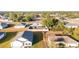 Aerial view of a house featuring a spacious backyard and a neighborhood setting at 2555 Sw 154Th Place Rd, Ocala, FL 34473