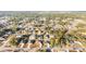 Aerial view showcasing a house's location in a residential neighborhood with mature trees at 2555 Sw 154Th Place Rd, Ocala, FL 34473