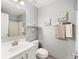 Clean bathroom featuring a vanity, toilet and shower/tub combo at 2555 Sw 154Th Place Rd, Ocala, FL 34473
