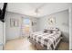 Bedroom with queen bed and large window at 2555 Sw 154Th Place Rd, Ocala, FL 34473