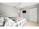 Bedroom with queen bed and double door closet at 2555 Sw 154Th Place Rd, Ocala, FL 34473