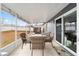 Screened in patio with outdoor seating area and view of the fenced in backyard at 2555 Sw 154Th Place Rd, Ocala, FL 34473