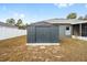 Gray metal storage shed with double doors at 2555 Sw 154Th Place Rd, Ocala, FL 34473