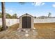 Large storage shed in backyard with stone pathway at 2555 Sw 154Th Place Rd, Ocala, FL 34473