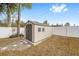 Tan and brown storage shed with double doors at 2555 Sw 154Th Place Rd, Ocala, FL 34473