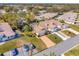 Aerial view of a house in a community setting, showing the property's location and neighborhood at 26607 Racquet Cir, Leesburg, FL 34748
