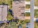 Bird's eye view of a house showing its layout, roof, and driveway at 26607 Racquet Cir, Leesburg, FL 34748