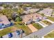 Property's aerial view showcasing its location and surrounding area at 26607 Racquet Cir, Leesburg, FL 34748