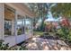 Spacious patio with a view of the backyard at 26607 Racquet Cir, Leesburg, FL 34748