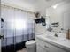 Clean bathroom with shower/tub, white vanity and updated fixtures at 27039 Racquet Cir, Leesburg, FL 34748