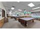 Relax and play in the community billiards room at 27039 Racquet Cir, Leesburg, FL 34748