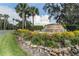 Landscaped entrance to the Highland Lakes community at 27039 Racquet Cir, Leesburg, FL 34748