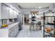 Spacious kitchen with stainless steel appliances and an island at 27039 Racquet Cir, Leesburg, FL 34748