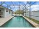 Inviting screened pool with brick pavers surrounding it at 2720 Savannah Dr, Leesburg, FL 34748