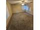 Spacious bedroom with carpeted floors and ample natural light at 29 Lonesome Pine Trl, Yalaha, FL 34797