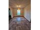 Bright dining room with tile flooring and chandelier at 29 Lonesome Pine Trl, Yalaha, FL 34797