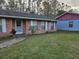 Brick house with front yard at 29 Lonesome Pine Trl, Yalaha, FL 34797