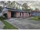 Brick house with attached garage at 29 Lonesome Pine Trl, Yalaha, FL 34797