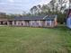 Brick ranch house with large yard at 29 Lonesome Pine Trl, Yalaha, FL 34797