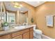 Clean bathroom with single sink vanity, shower, and toilet at 3459 Oldham Ln, The Villages, FL 32163