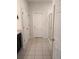Well-lit bathroom featuring tile floors, a walk-in shower, and a vanity with sink at 37030 Lake Overlook Dr, Grand Island, FL 32735