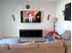 Cozy living room featuring comfortable seating, TV, decor, and neutral color palette at 37030 Lake Overlook Dr, Grand Island, FL 32735