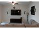Cozy living room featuring a comfortable gray sofa, a large TV, modern decor, and ample natural light at 37030 Lake Overlook Dr, Grand Island, FL 32735