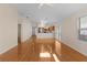 Spacious living room featuring hardwood floors and open concept at 446 Flossmoor Ct, The Villages, FL 32162
