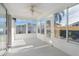 Bright sunroom with multiple windows and access to backyard at 446 Flossmoor Ct, The Villages, FL 32162