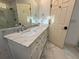 Double vanity bathroom with marble countertops at 511 Jessamine Blvd, Daytona Beach, FL 32118