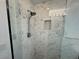 Shower with marble tile and glass enclosure at 511 Jessamine Blvd, Daytona Beach, FL 32118