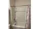 Bathroom with shower/tub combo and tile surround at 5274 Mayor Dr, St Cloud, FL 34771