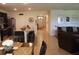 Open concept living and dining area with kitchen view at 5274 Mayor Dr, St Cloud, FL 34771