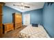 Bedroom with double bed and wood furniture at 5756 Lakeside Landings Blvd, Winter Haven, FL 33881