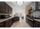 Open concept kitchen with an island and stainless steel appliances at 5756 Lakeside Landings Blvd, Winter Haven, FL 33881